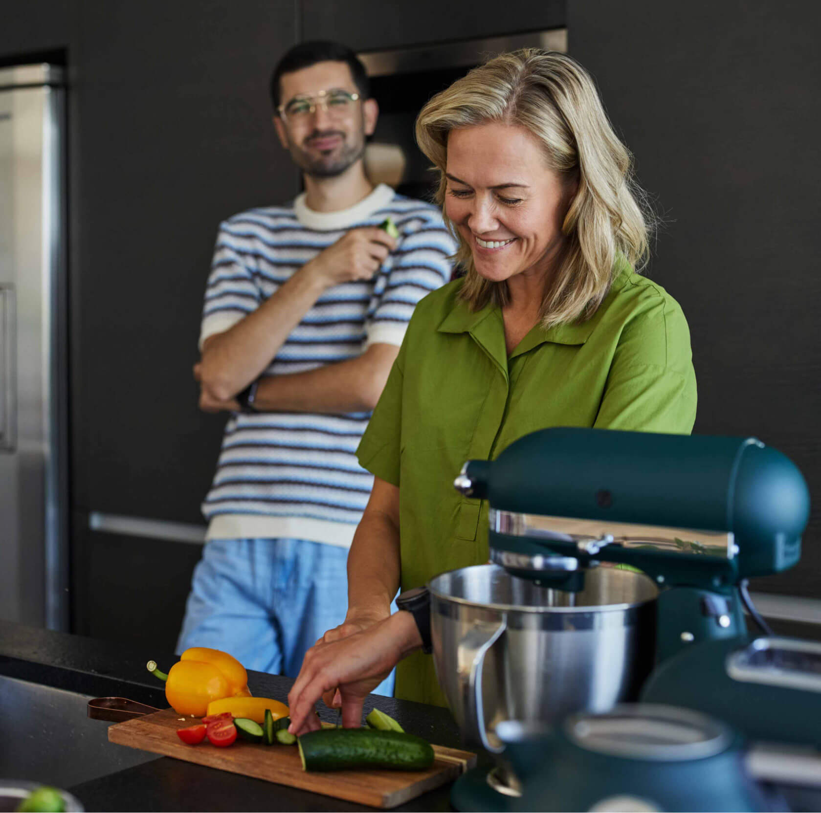 Parent and child enjoying breakfast in their new kitchen